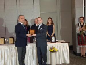 Professor A.Caragea receives the prize