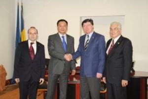 Handshake of friendship-Ambassador Daulet Batrashev and Senate Vice-President-Ioan Chelaru